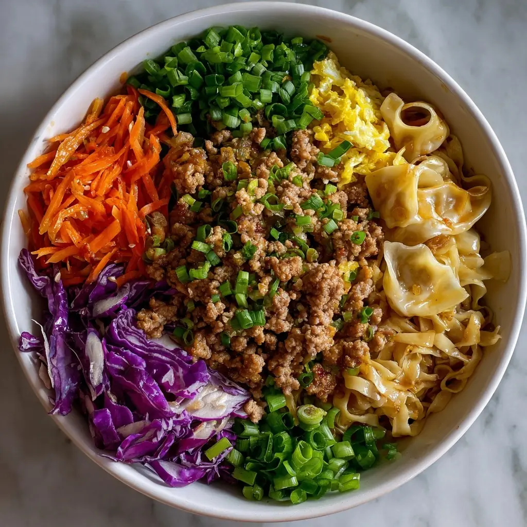 Potsticker Noodle Bowl with Pork & Cabbage Slaw Delight!