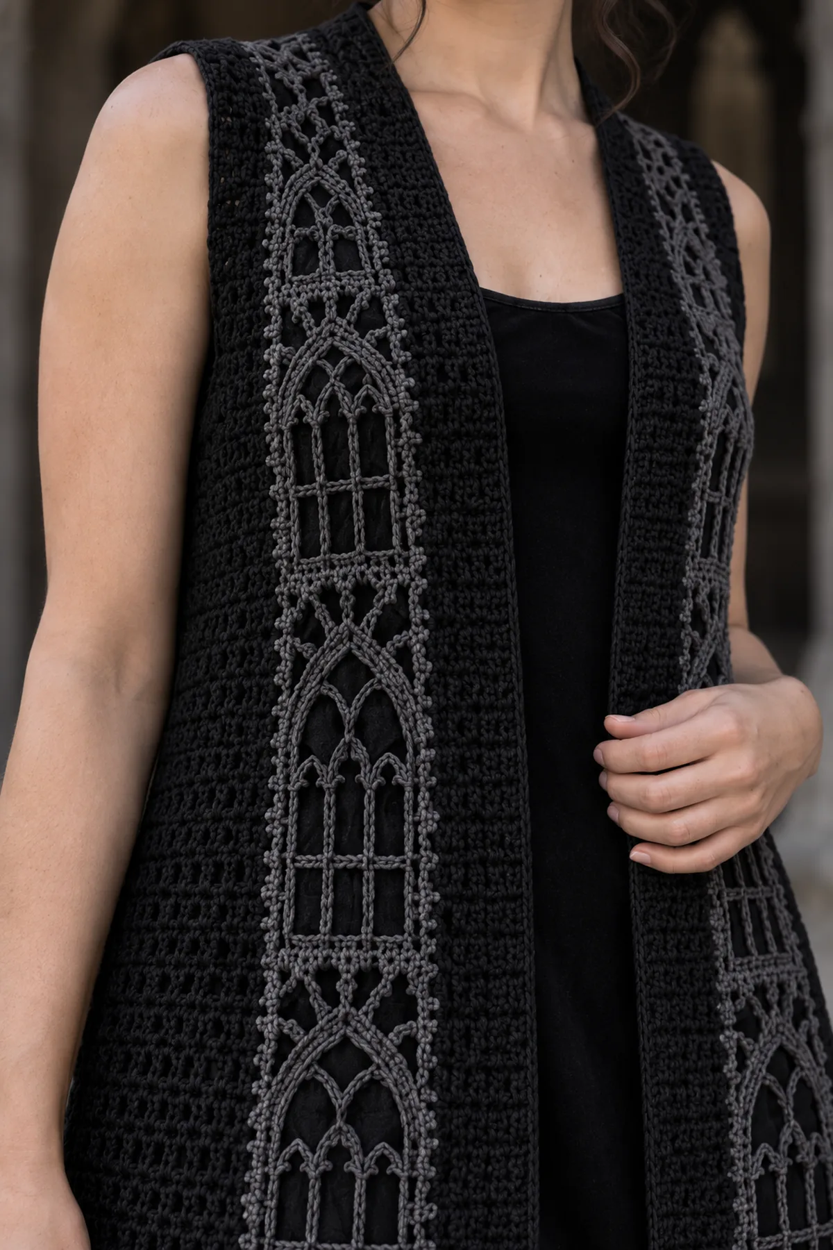 Close-up crochet texture and themed detail for women's gothic crochet cathedral mesh duster vest